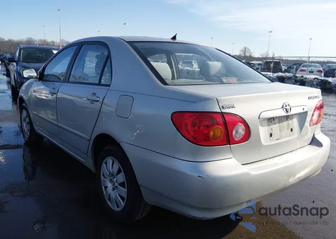 2004 Toyota Corolla Le z USA, uszkodzony, nr VIN 2T1BR32E04C205841